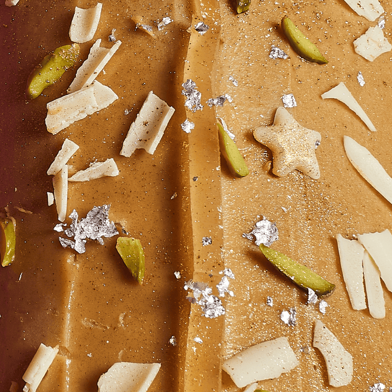 Cutter & Squidge Eid Spiced Sticky Toffee Date & White Chocolate Roulade